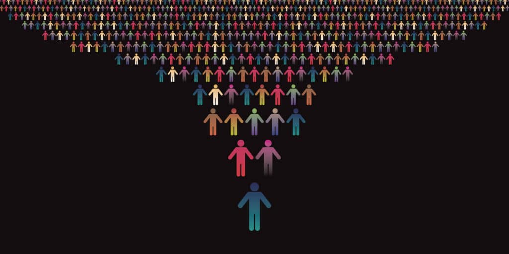 A growing group of people with one clear leader in front