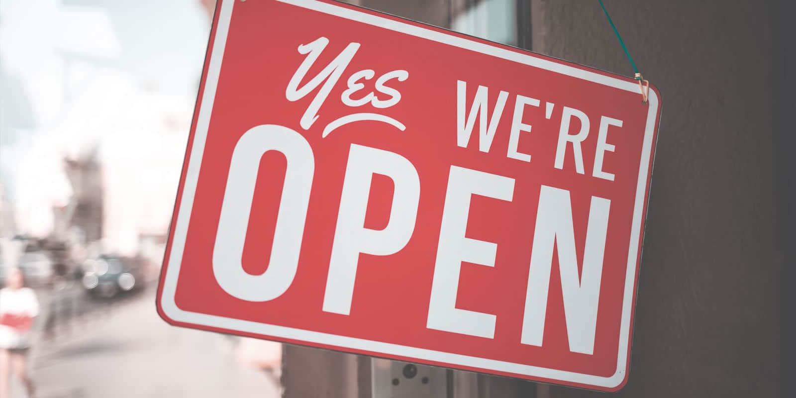 sign that says: Yes we're open