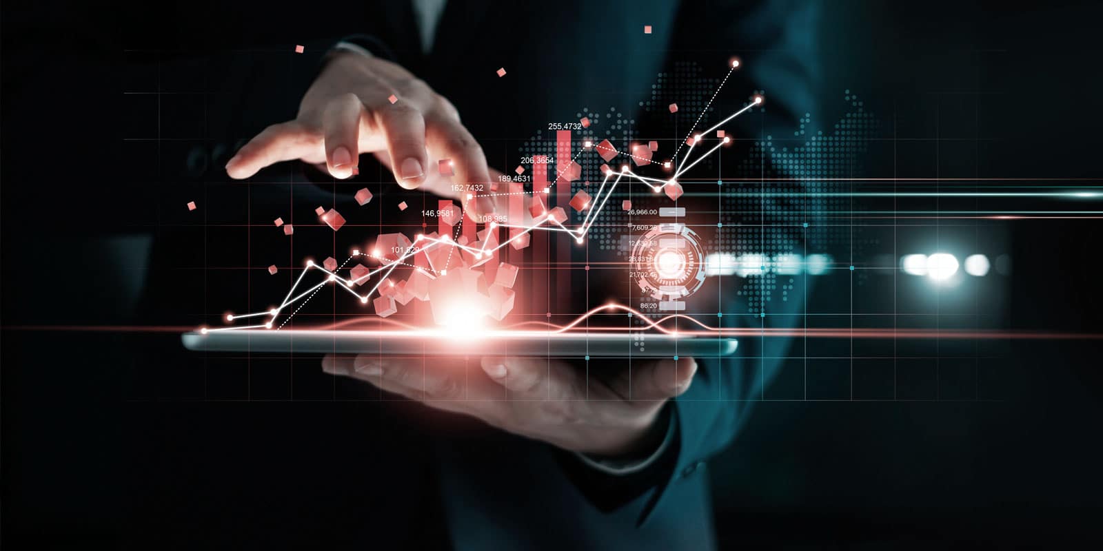 hand holding tablet with other hand manipulating holographic data over it