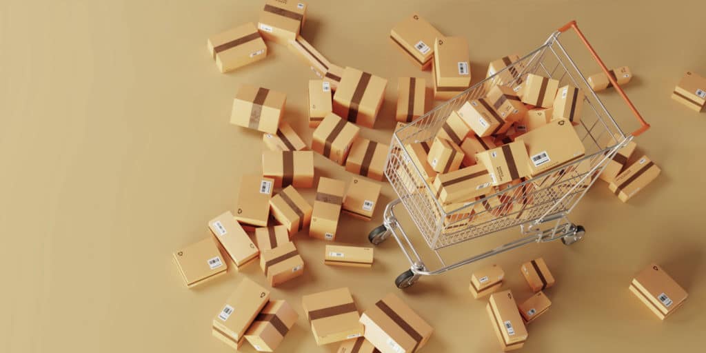 Shopping cart full of boxes with boxes overflowing onto the floor
