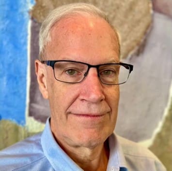 Mark Brohan wearing glasses