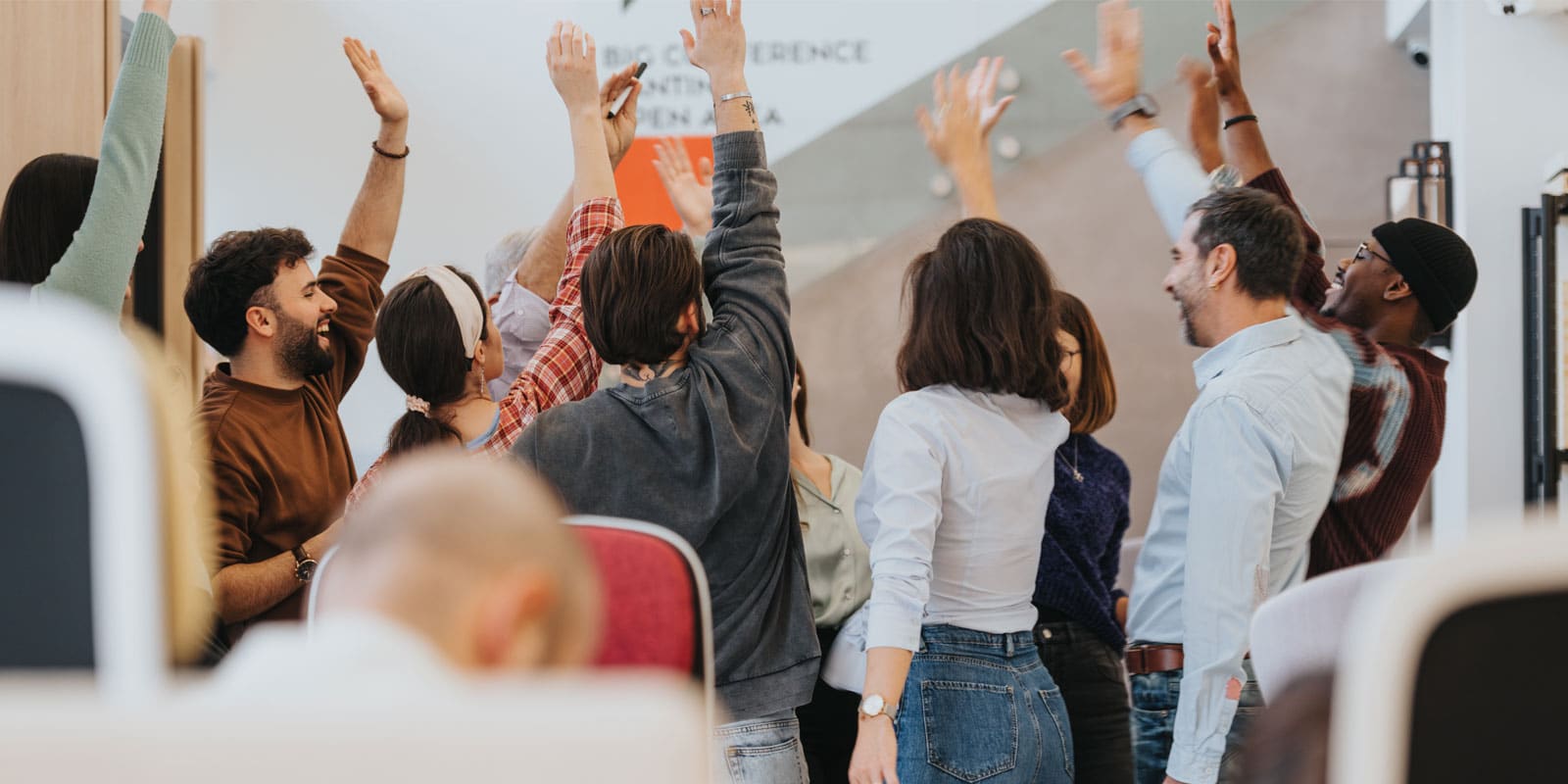 Group of employees celebrating great workplace culture.